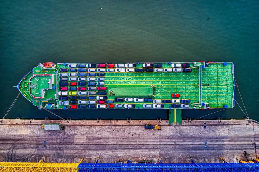 pexels photo 2217513 Aerial view of a car transport ship docked at Bekasi port, Indonesia.